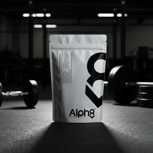 Alph8 supplement package on a gym floor with weights in the background